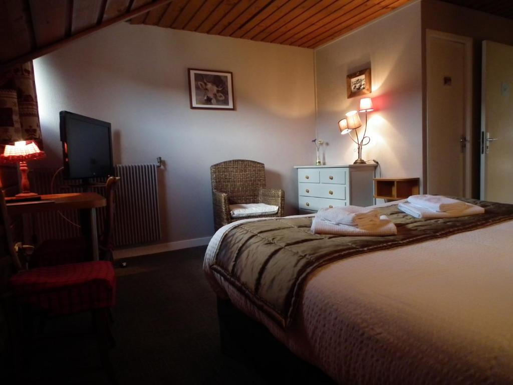 Postel nebo postele na pokoji v ubytování Hôtel de l'Aviation