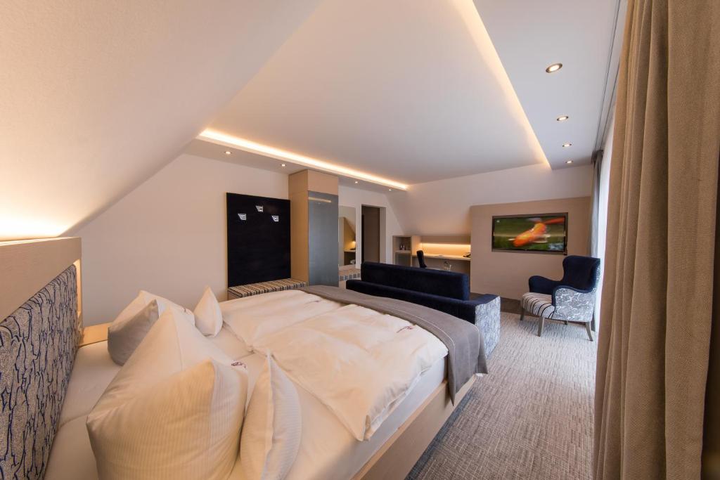 Postel nebo postele na pokoji v ubytování Hotel Graf Bentinck