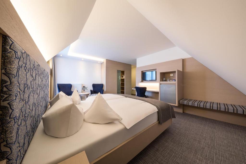 Postel nebo postele na pokoji v ubytování Hotel Graf Bentinck