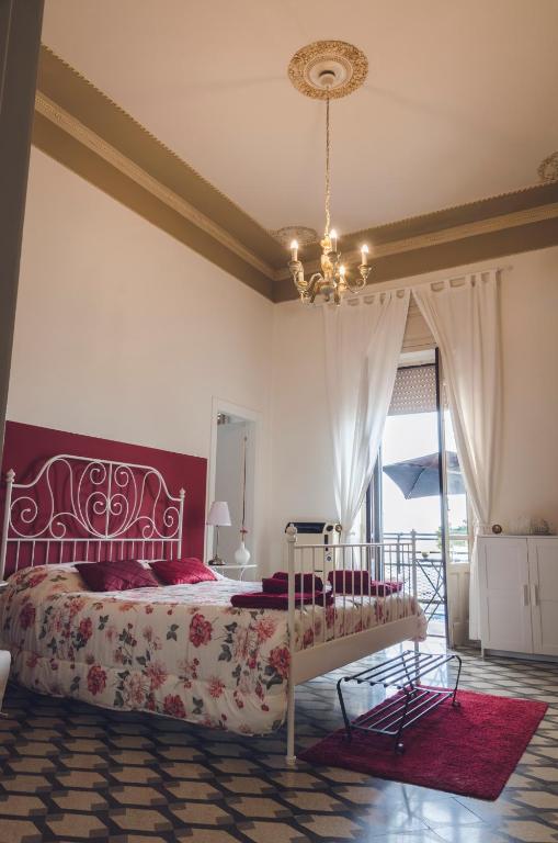 Postel nebo postele na pokoji v ubytování Aretè Guest House