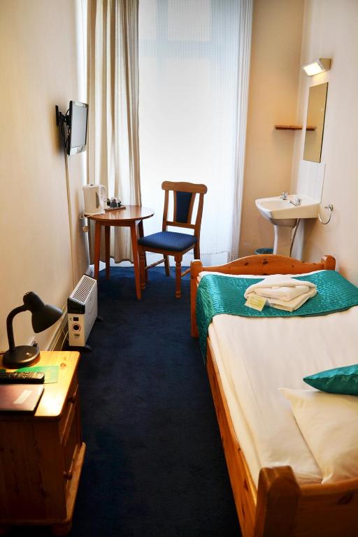 Postel nebo postele na pokoji v ubytování 72QT