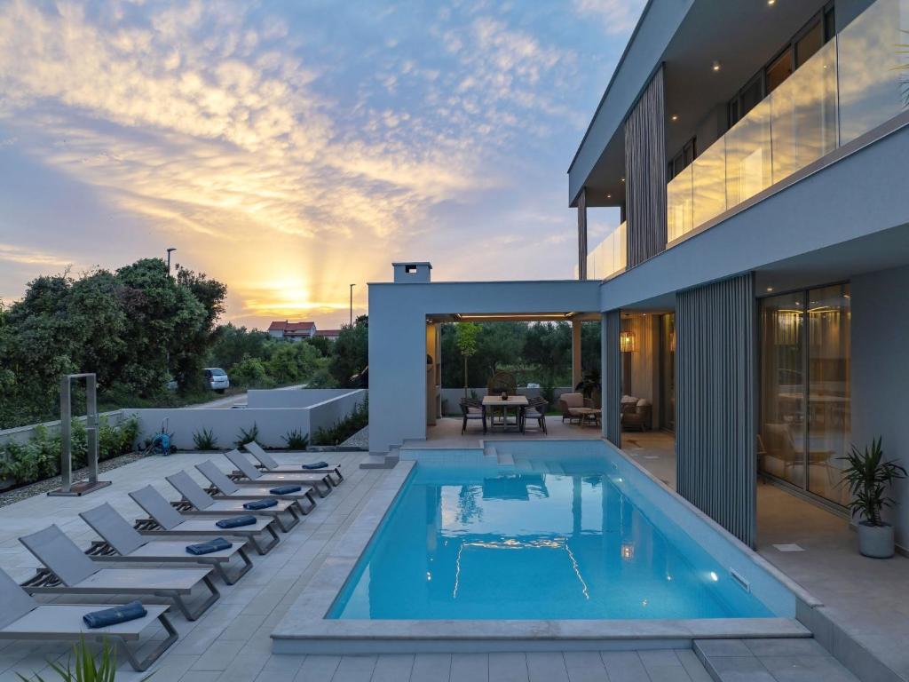 Villa 5 Luxury villa La Casa with heated pool and sauna by Interhome