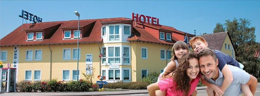 a group of people posing in front of a hotel at Euro-Hotel in Kappel-Grafenhausen