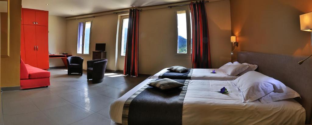 Postel nebo postele na pokoji v ubytování Logis auberge restaurant Du Vigneron