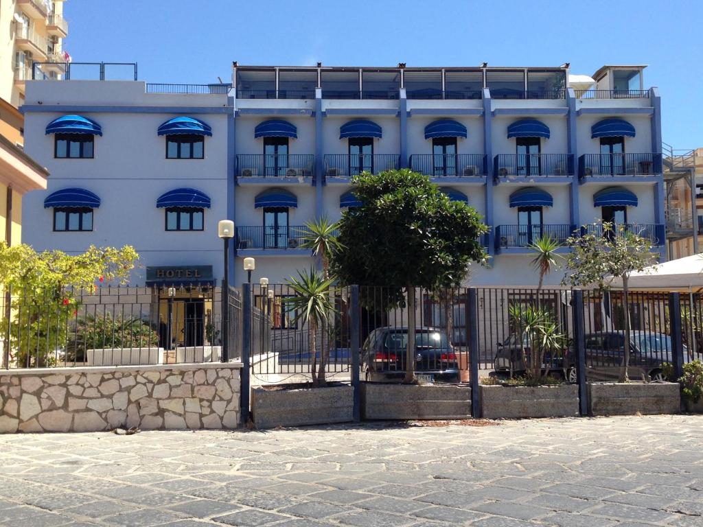 a large building with a lot of windows at Hotel Al Faro in Licata