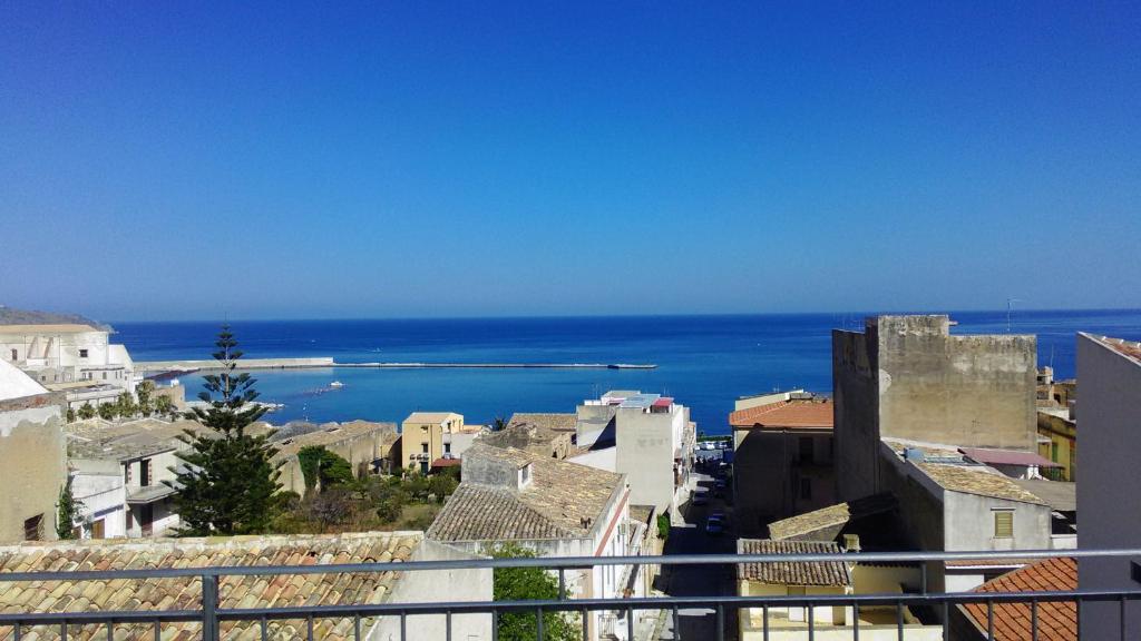 a view of the ocean from a city at Appartamenti Via Marconi in Castellammare del Golfo