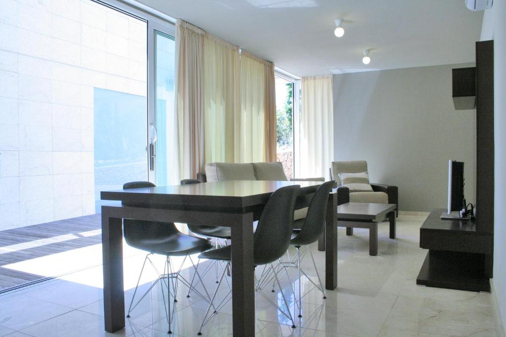 Posezení v ubytování L' Escala Resort