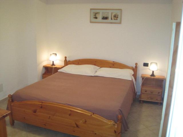 Postel nebo postele na pokoji v ubytování B&B Fattore