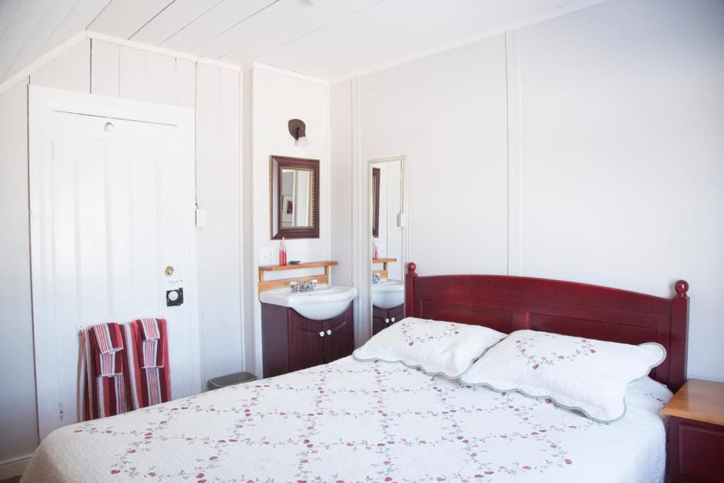 Postel nebo postele na pokoji v ubytování Gîte Au Coin De La Berge