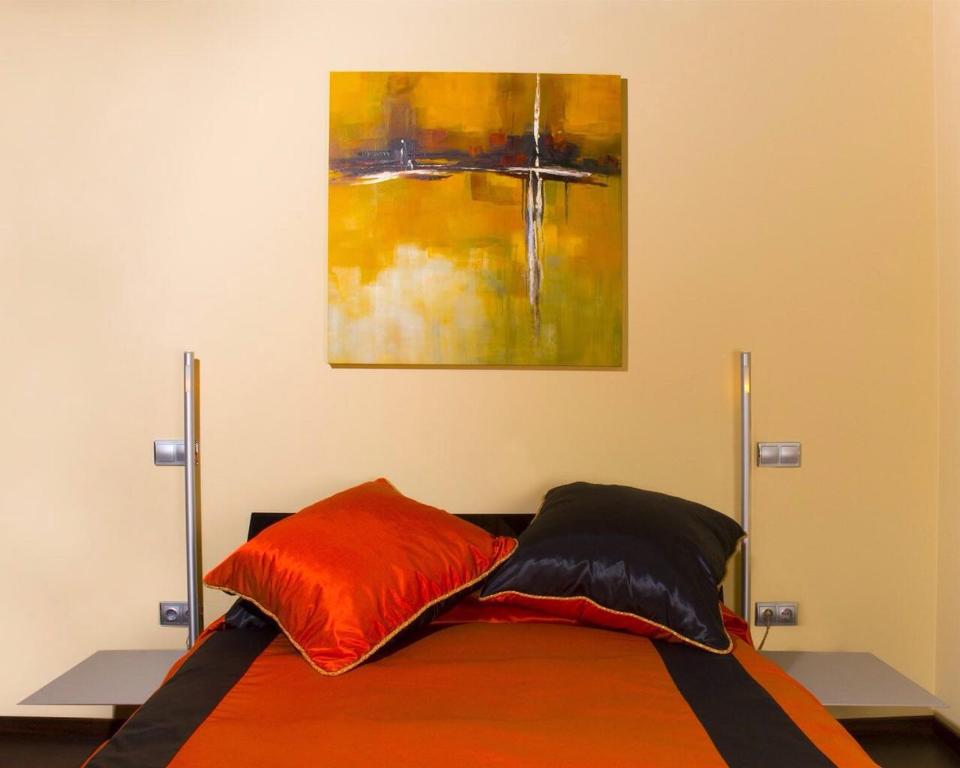 A bed or beds in a room at Alojamiento la Luz de la Sierra