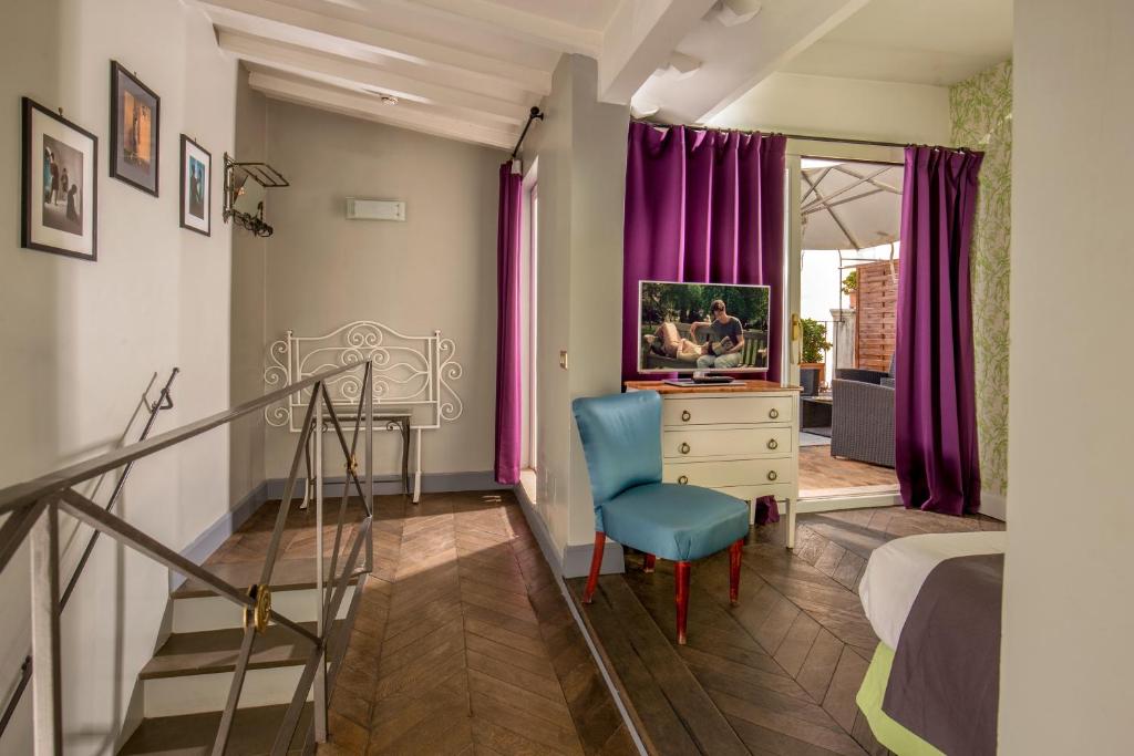 TV a/nebo společenská místnost v ubytování Boutique Hotel Anahi