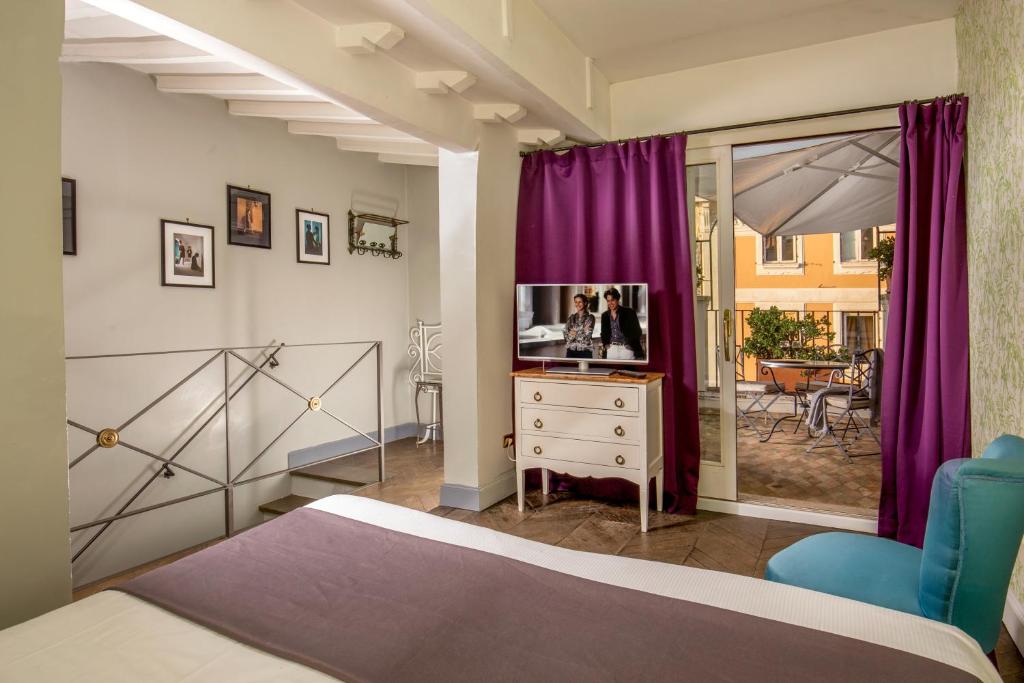 TV a/nebo společenská místnost v ubytování Boutique Hotel Anahi