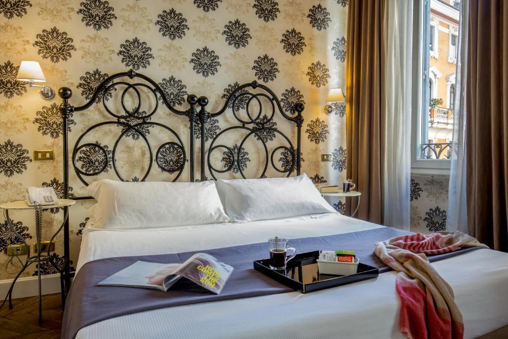 Postel nebo postele na pokoji v ubytování Boutique Hotel Anahi