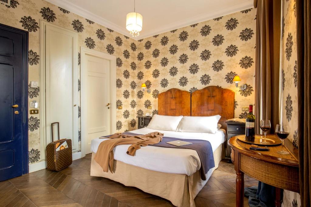 Postel nebo postele na pokoji v ubytování Boutique Hotel Anahi