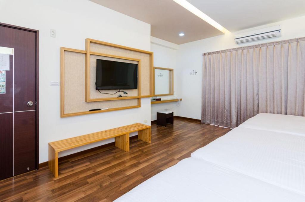 TV a/nebo společenská místnost v ubytování 海漣天海岸民宿 & 水連天海景電梯民宿 Sea Sky Coast Homestay & Shui-lian-tian Homestay
