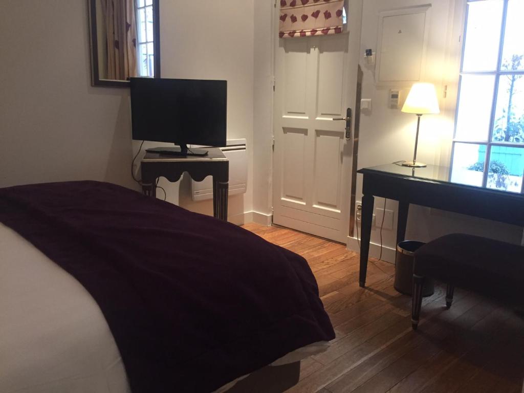 Hotel Suites Unic Renoir Saint-Germain - Resim 31