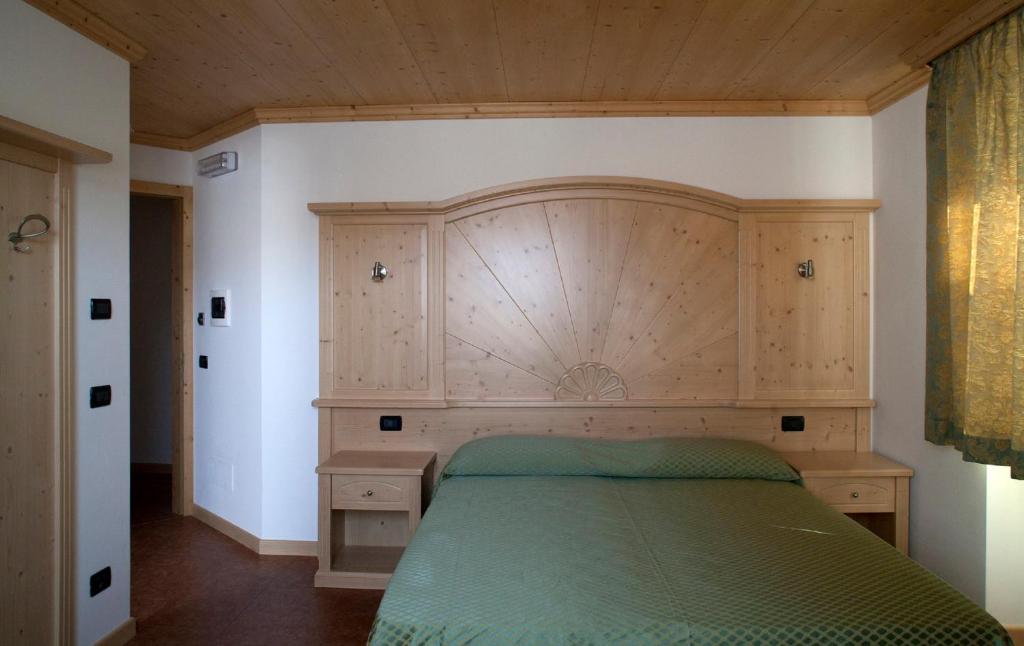 Postel nebo postele na pokoji v ubytování Agritur Scoiattolo