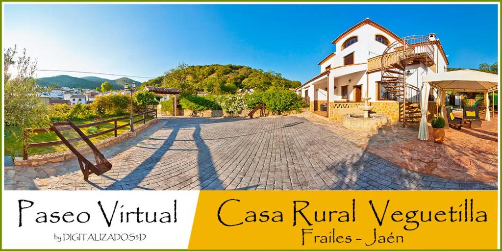 a building on a cobblestone street in front of a building at Alojamiento Rural la Veguetilla in Frailes