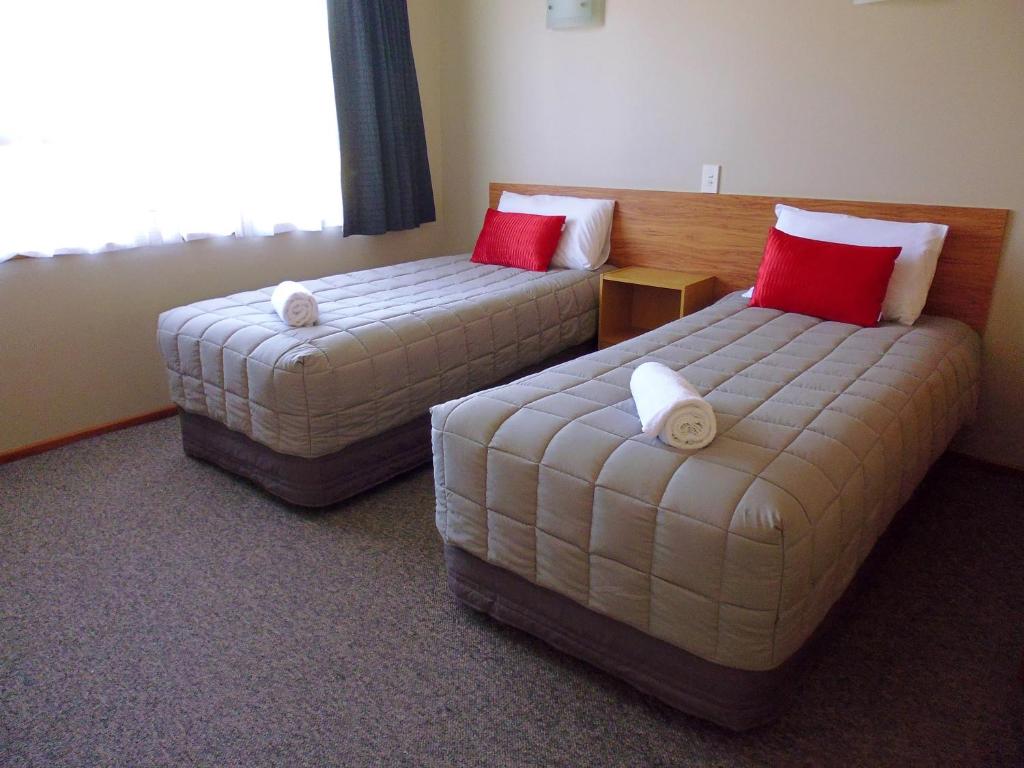 Postel nebo postele na pokoji v ubytování Broadview Motel