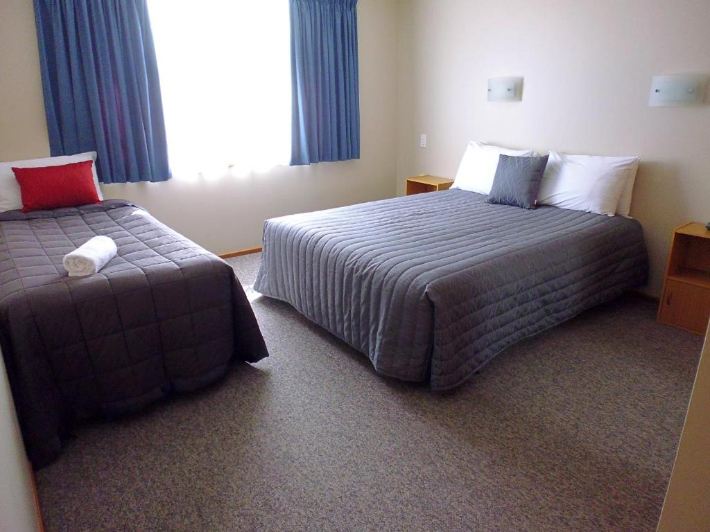 Postel nebo postele na pokoji v ubytování Broadview Motel