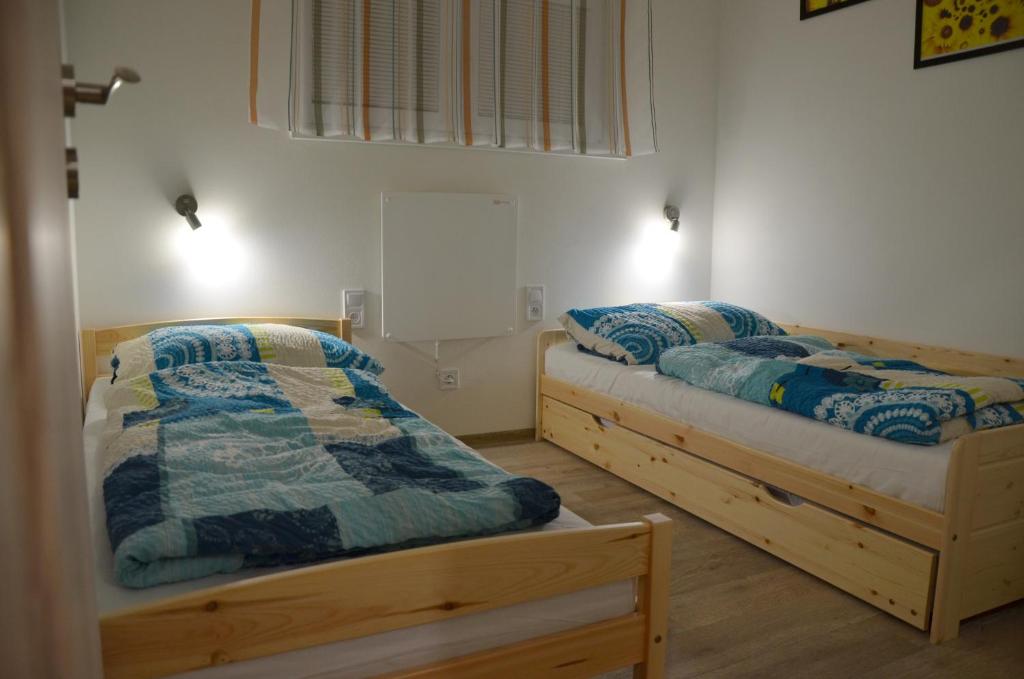Postel nebo postele na pokoji v ubytování Pohoda Morava
