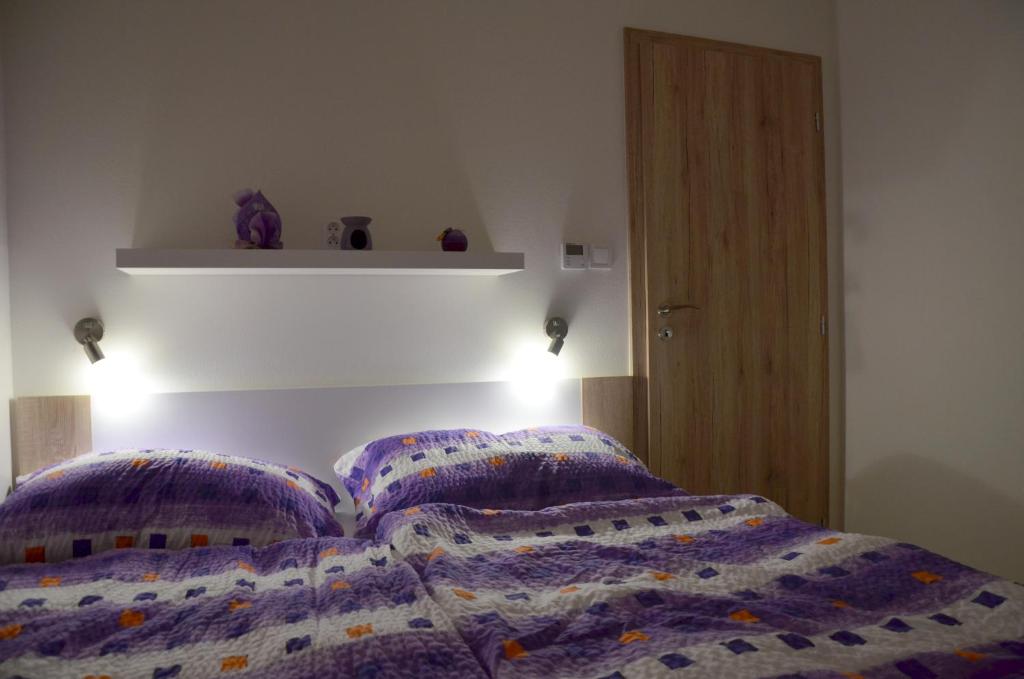 Postel nebo postele na pokoji v ubytování Pohoda Morava