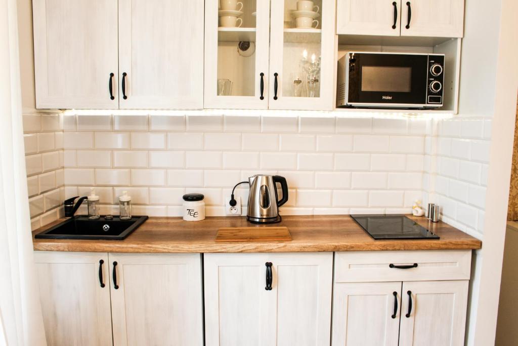 Kuchyňa alebo kuchynka v ubytovaní Gold Box Apartament