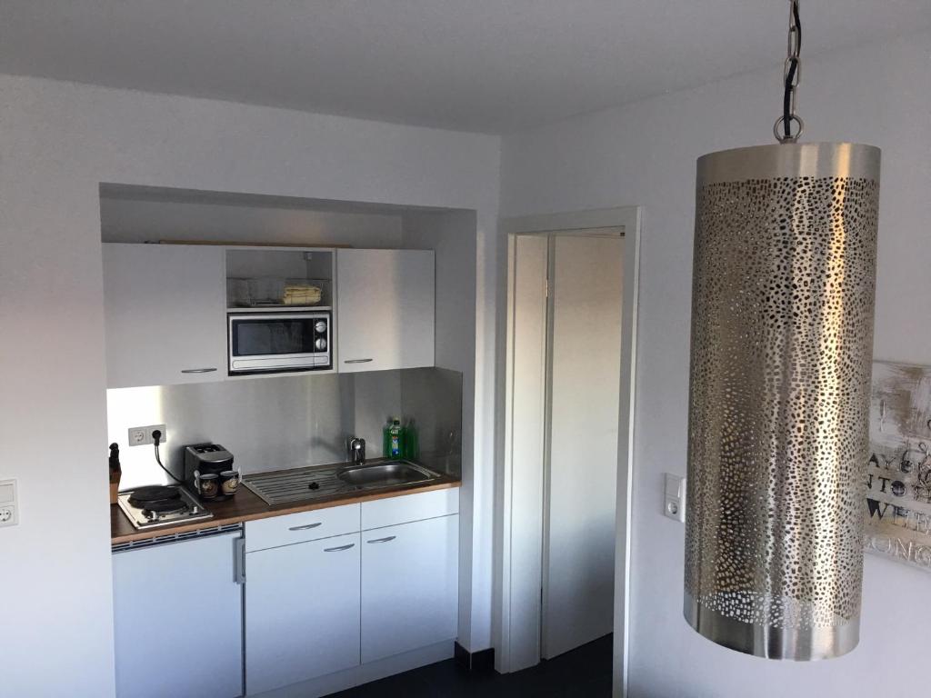 Kuchyň nebo kuchyňský kout v ubytování Business Appartements