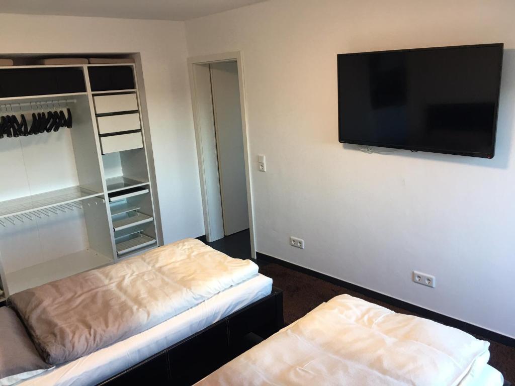 Postel nebo postele na pokoji v ubytování Business Appartements