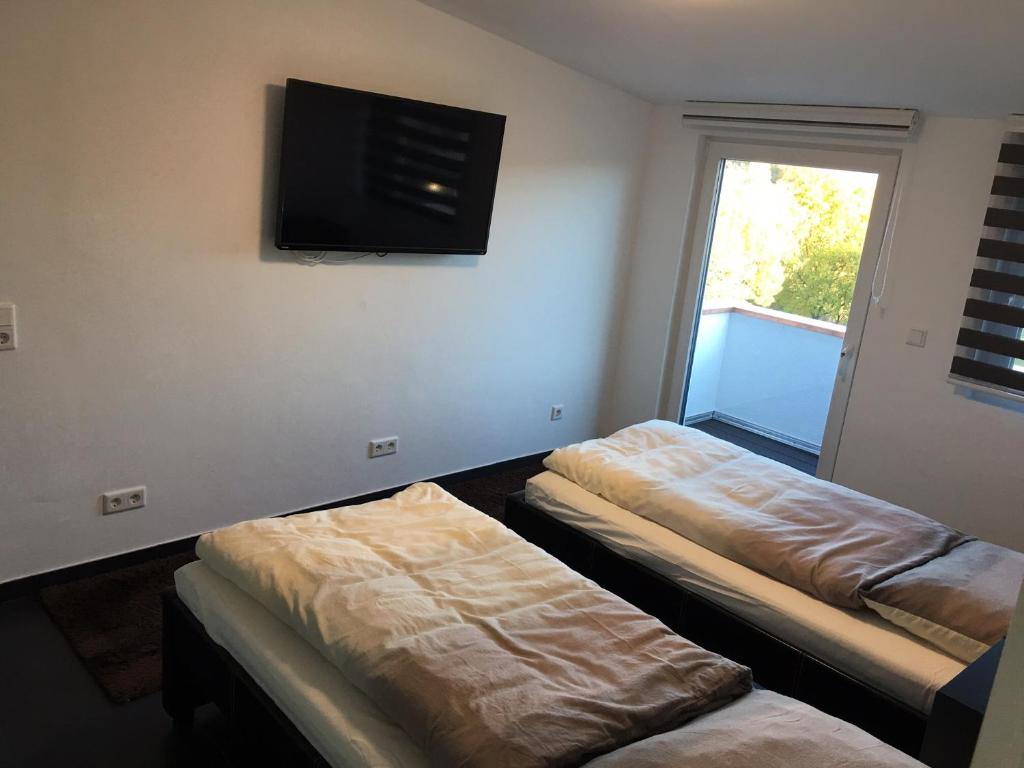 Postel nebo postele na pokoji v ubytování Business Appartements