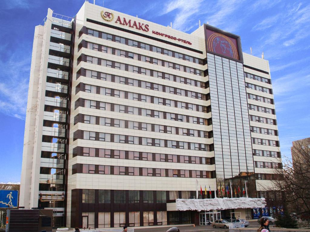 a large white building with aania sign on it at AMAKS Congress Hotel in Rostov on Don