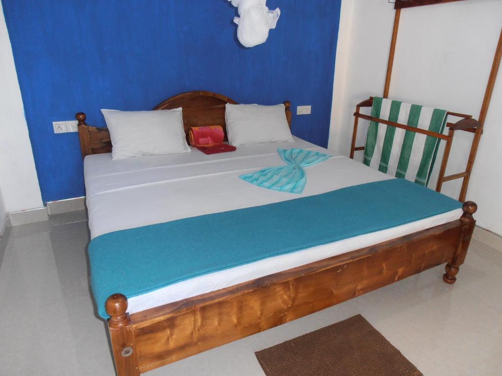 Postel nebo postele na pokoji v ubytování Mellow Homestay