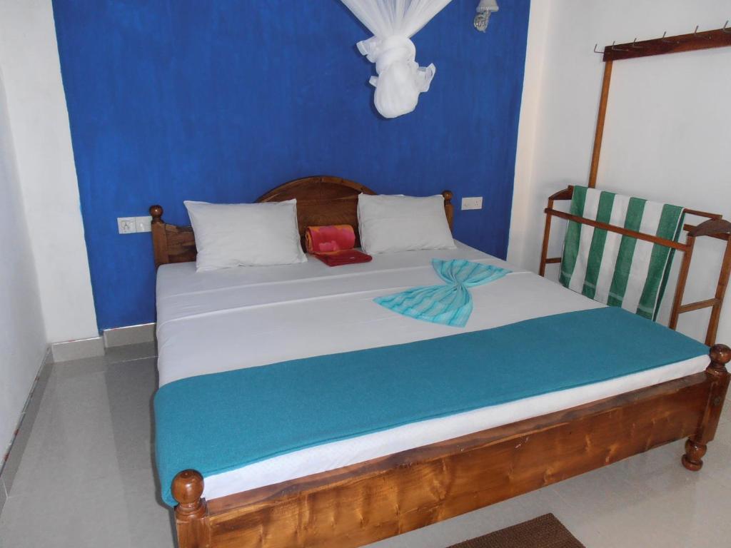 Postel nebo postele na pokoji v ubytování Mellow Homestay