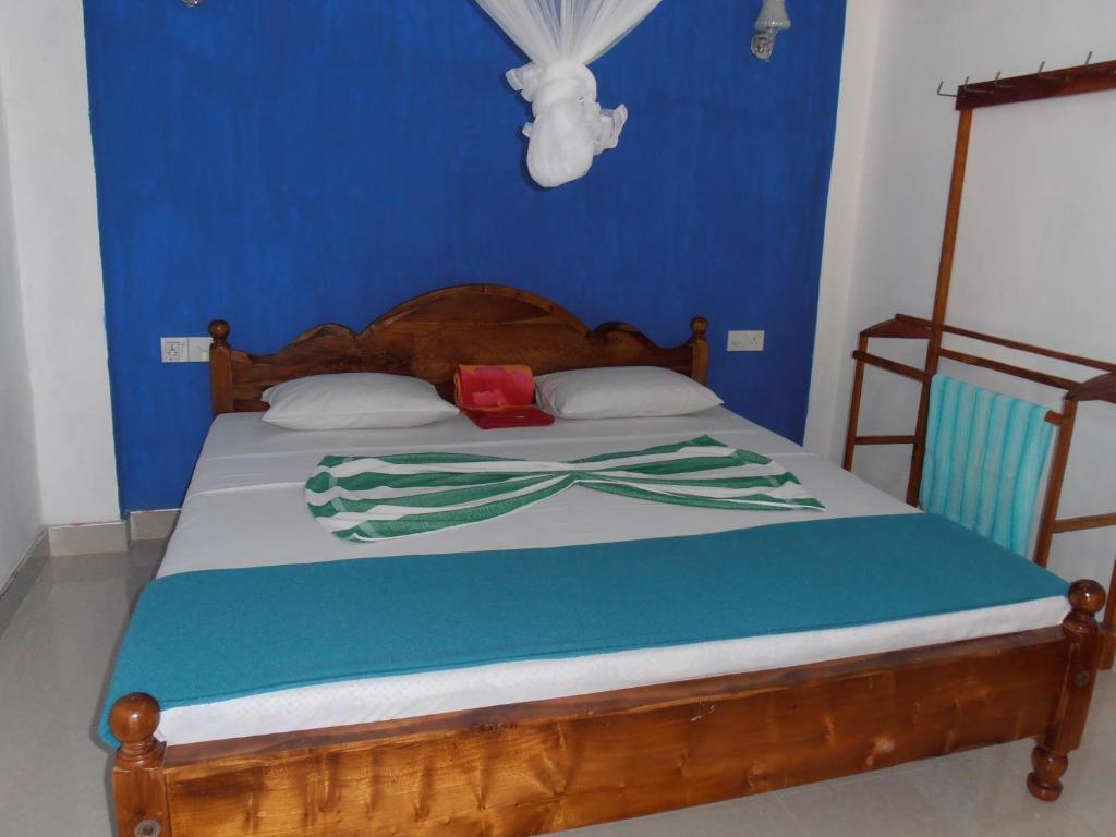 Postel nebo postele na pokoji v ubytování Mellow Homestay