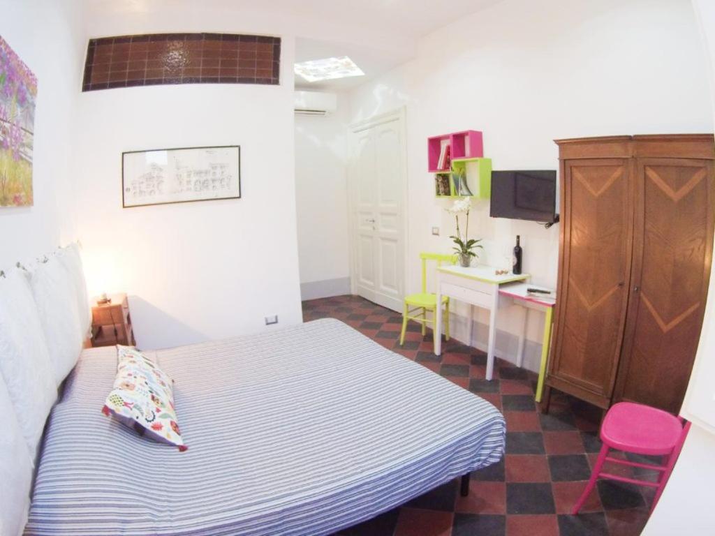 Letto o letti in una camera di L'architetto