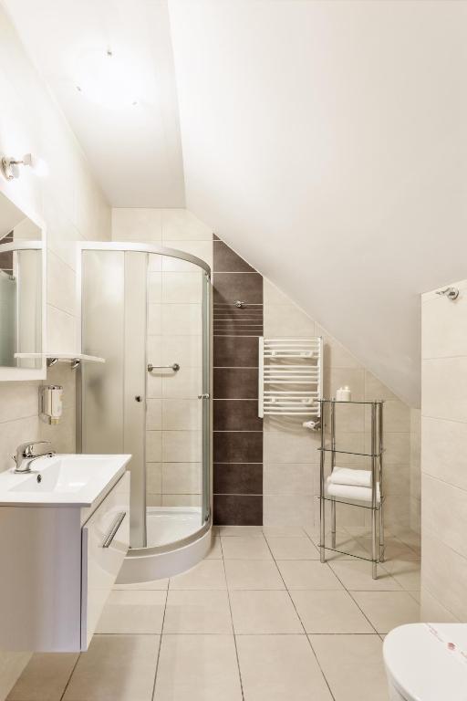 Kúpeľňa v ubytovaní Hotel Modrzewiowy Dwór