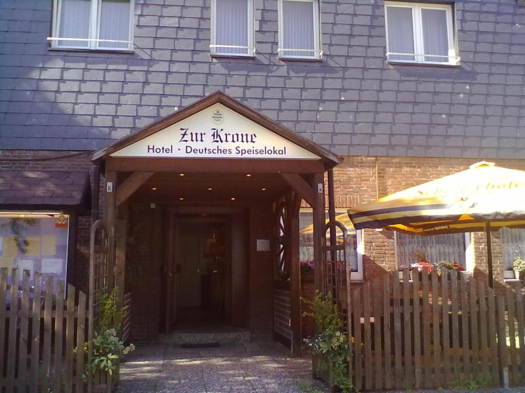 a building with a sign on the front of it at Zur Krone in Seelze