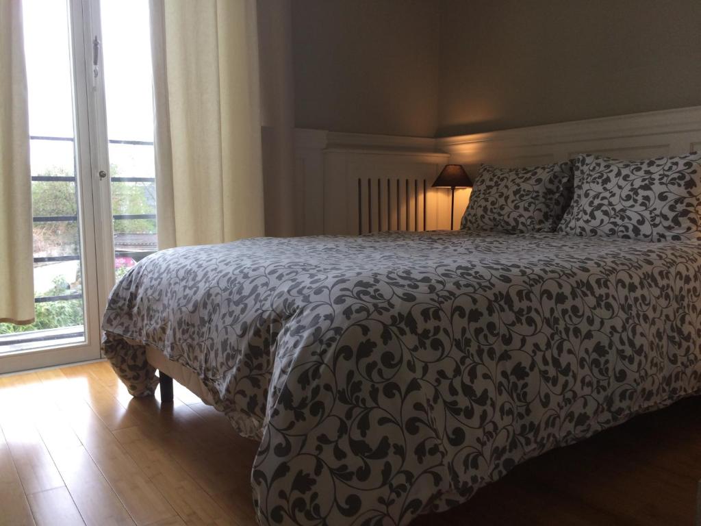 Postel nebo postele na pokoji v ubytování Hotel Saint Georges