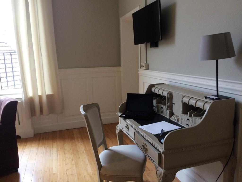 TV a/nebo společenská místnost v ubytování Hotel Saint Georges
