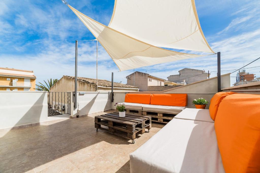 A balcony or terrace at Ca Sa Padrina by LOCALITE