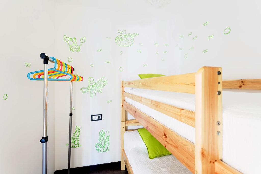 A bed or beds in a room at Ca Sa Padrina by LOCALITE