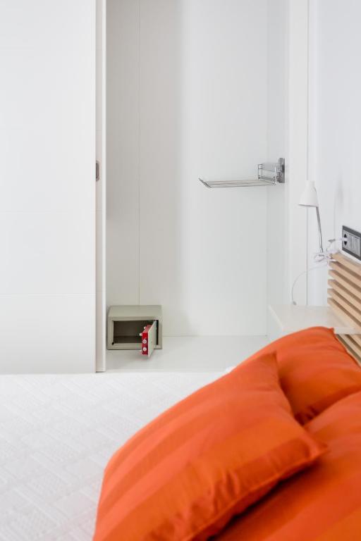 A bed or beds in a room at Ca Sa Padrina by LOCALITE