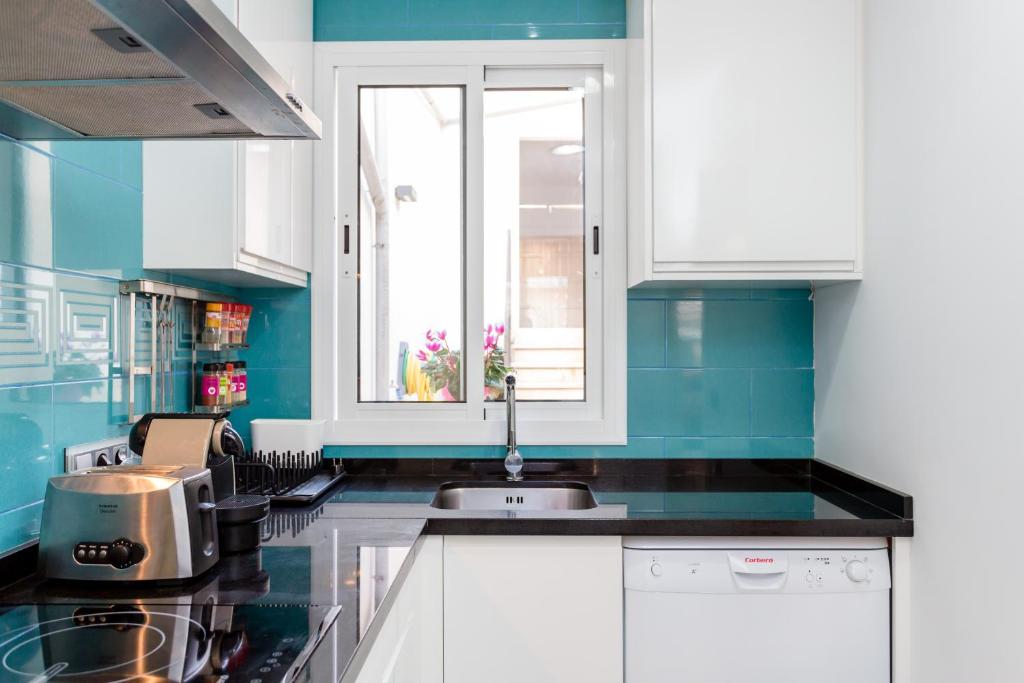 A kitchen or kitchenette at Ca Sa Padrina by LOCALITE