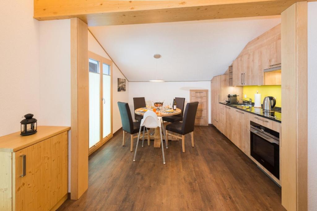 Kuchyň nebo kuchyňský kout v ubytování B&B AZapartments Lunic