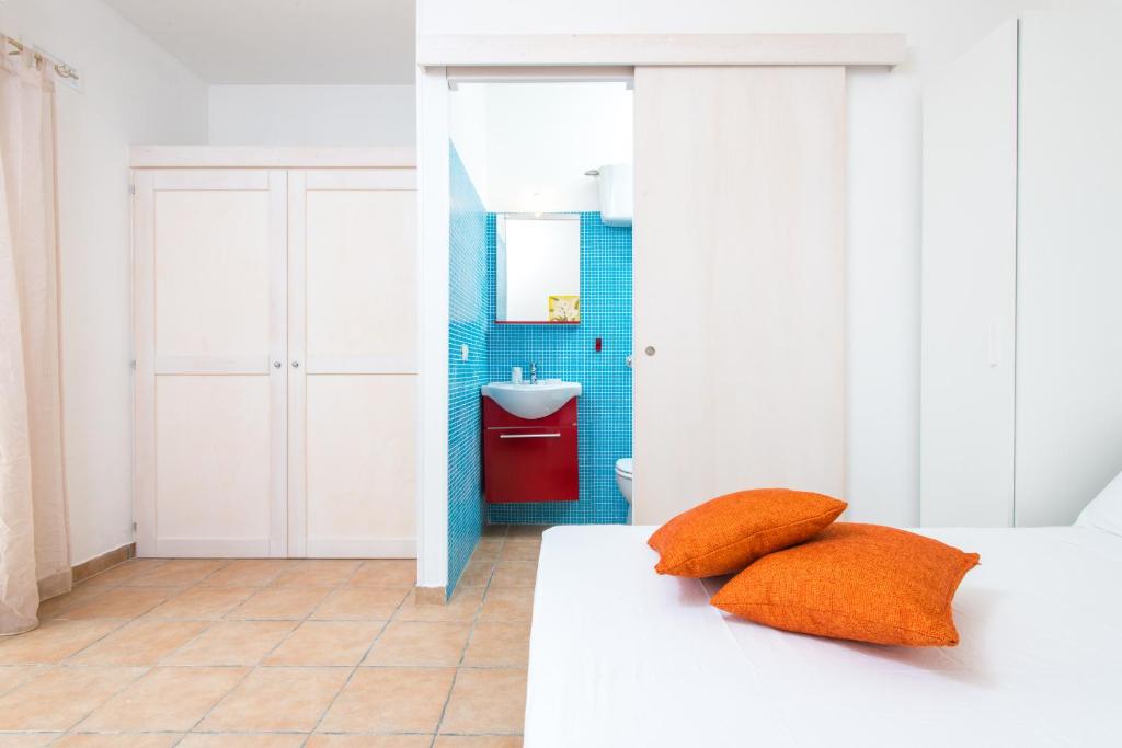 Postel nebo postele na pokoji v ubytování Core Resort