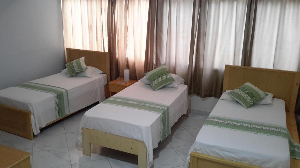 Postel nebo postele na pokoji v ubytování LT Aparthotel
