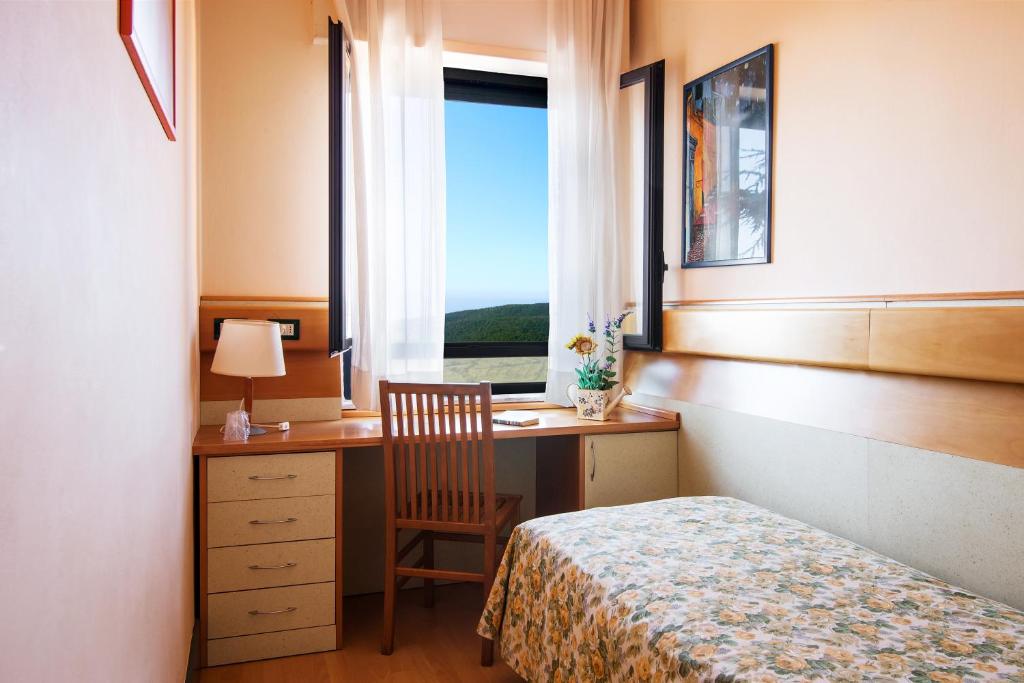 Postel nebo postele na pokoji v ubytování Duca Del Mare - Hotel Di Nardo group