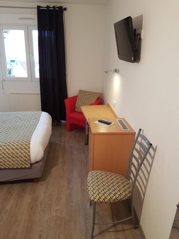 Postel nebo postele na pokoji v ubytování Hôtel Des Bois