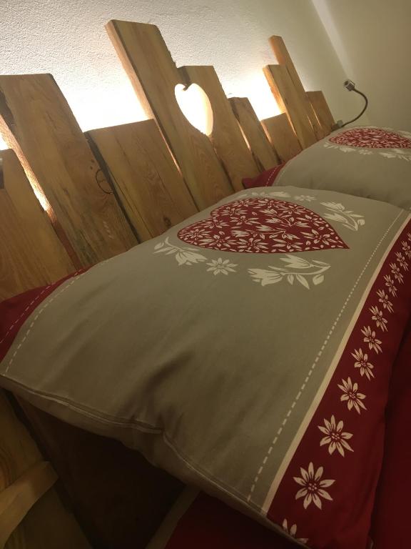 Postel nebo postele na pokoji v ubytování Atmosphere di montagna