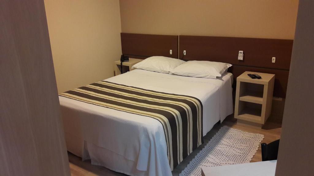 Postel nebo postele na pokoji v ubytování Hotel Sol By MRHotelaria